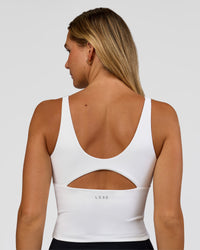Woman wearing Vitality Active Tank - White | Model:Amity | Size:S | Thumbnail Index: 2
