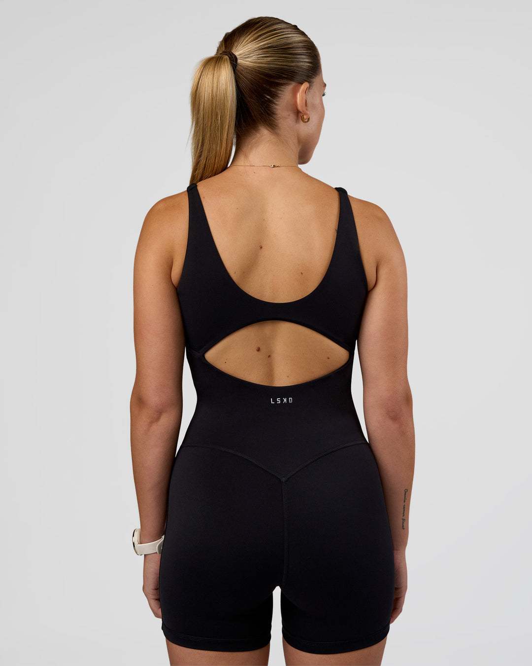 Woman wearing Vitality Bodysuit - Black | Model:Myrte | Size:S - view 8