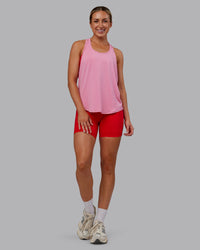 Woman wearing AeroFLX+ Drop Armhole Seamless Tank - Candy Pink | Model:Paris | Size:S | Thumbnail Index: 2