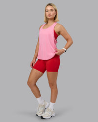 Woman wearing AeroFLX+ Drop Armhole Seamless Tank - Candy Pink | Model:Halle | Size:S | Thumbnail Index: 6
