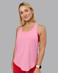 Woman wearing AeroFLX+ Drop Armhole Seamless Tank - Candy Pink | Model:Halle | Size:S | Thumbnail Index: 10