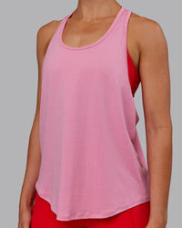 Woman wearing AeroFLX+ Drop Armhole Seamless Tank - Candy Pink | Model:Paris | Size:S | Thumbnail Index: 9