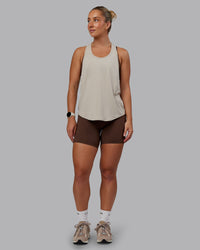 Woman wearing AeroFLX+ Drop Armhole Seamless Tank - Shale Beige | Model:Lyss | Size:S | Thumbnail Index: 5