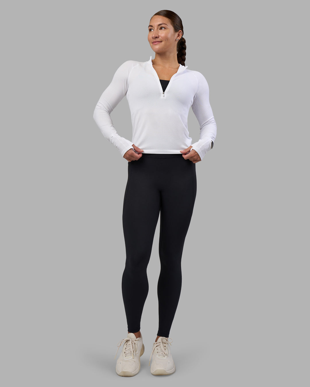 Woman wearing AeroFLX+ Long Sleeve Half Zip - White/White | Model:Hannah | Size:S - view 5