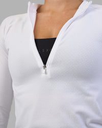 Woman wearing AeroFLX+ Long Sleeve Half Zip - White/White | Model:Hannah | Size:S | Thumbnail Index: 5