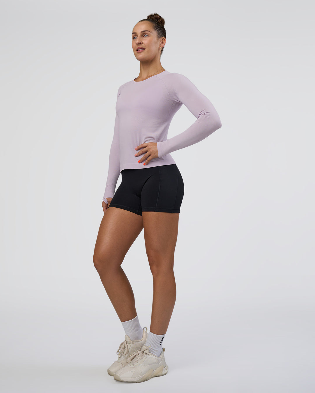 Woman wearing AeroFLX+ Seamless Long Sleeve Tee - Fair Orchid/Fair Orchid | Model:Abbey | Size:S - view 5