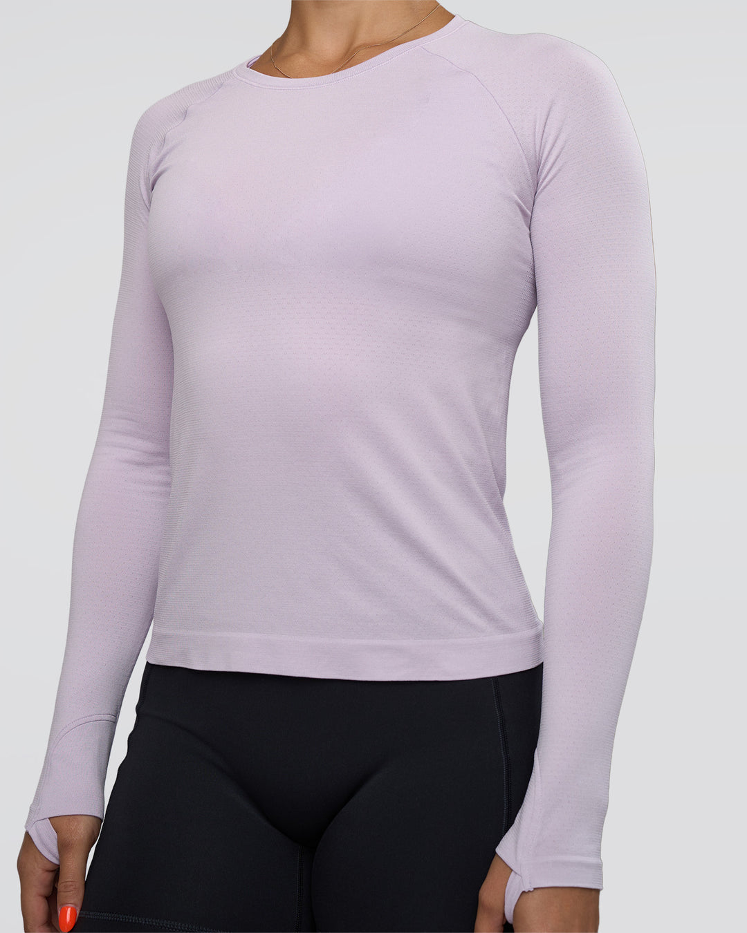 Woman wearing AeroFLX+ Seamless Long Sleeve Tee - Fair Orchid/Fair Orchid | Model:Abbey | Size:S - view 4