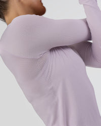 Woman wearing AeroFLX+ Seamless Long Sleeve Tee - Fair Orchid/Fair Orchid | Model:Abbey | Size:S | Thumbnail Index: 7