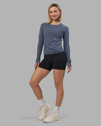 Woman wearing AeroFLX+ Seamless Long Sleeve Tee - Night Shadow/Night Shadow | Model:Halle | Size:S | Thumbnail Index: 0