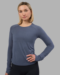 Woman wearing AeroFLX+ Seamless Long Sleeve Tee - Night Shadow/Night Shadow | Model:Halle | Size:S | Thumbnail Index: 1