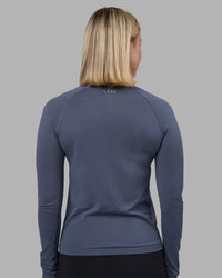 Woman wearing AeroFLX+ Seamless Long Sleeve Tee - Night Shadow/Night Shadow | Model:Halle | Size:S | Thumbnail Index: 2