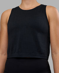 Woman wearing AeroFLX+ Seamless Skimmer Tank - Black Marl | Model:Charlize | Size:S | Thumbnail Index: 3