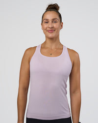 Woman wearing AeroFLX+ Seamless Tank - Fair Orchid/Fair Orchid | Model:Abbey | Size:S | Thumbnail Index: 0