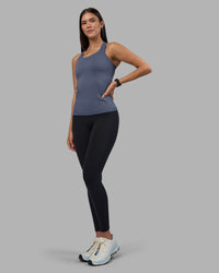 Woman wearing AeroFLX+ Seamless Tank - Night Shadow/Night Shadow | Model:Rhiley | Size:S | Thumbnail Index: 1