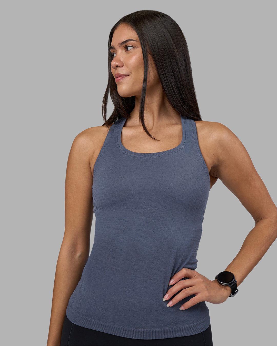 Woman wearing AeroFLX+ Seamless Tank - Night Shadow/Night Shadow | Model:Rhiley | Size:S - view 1