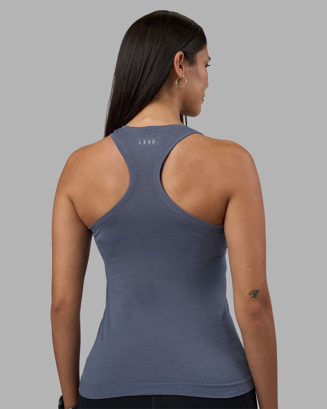 Woman wearing AeroFLX+ Seamless Tank - Night Shadow/Night Shadow | Model:Rhiley | Size:S - view 3