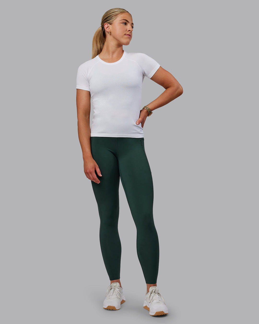 Woman wearing AeroFLX+ Seamless Tee - White/White - view 7