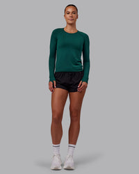 Woman wearing AeroFLX+ Seamless Long Sleeve Tee - Dark Moss/Dark Moss | Model:Charlize | Size:S | Thumbnail Index: 6
