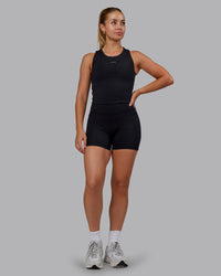 Woman wearing Base Tank - Black | Size:S | Model:Hannah | Thumbnail Index: 1