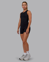 Woman wearing Base Tank - Black | Size:S | Model:Hannah | Thumbnail Index: 4