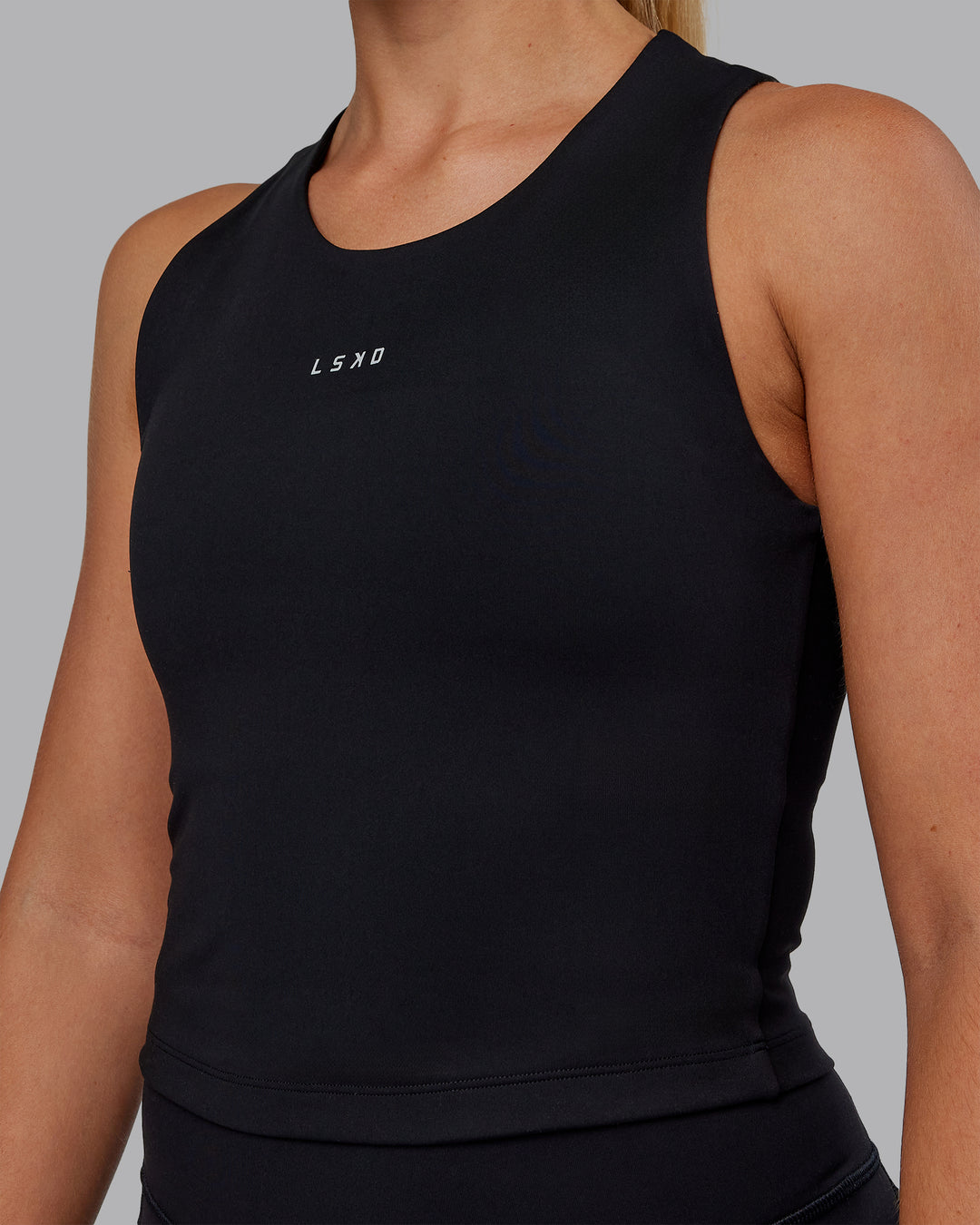 Woman wearing Base Tank - Black | Size:S | Model:Hannah - view 4