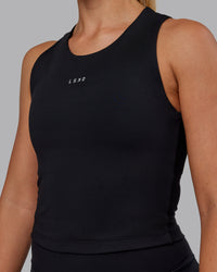 Woman wearing Base Tank - Black | Size:S | Model:Hannah | Thumbnail Index: 3