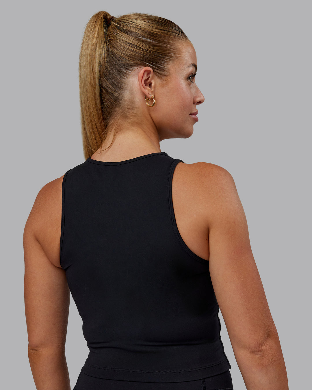 Woman wearing Base Tank - Black | Size:S | Model:Hannah - view 3