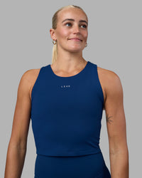 Woman wearing Base Tank - Midnight Blue | Model:Katie | Size:S | Thumbnail Index: 0