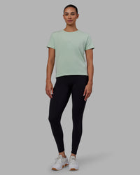 Woman wearing Deluxe PimaFLX Tee - Surf Spray | Thumbnail Index: 0