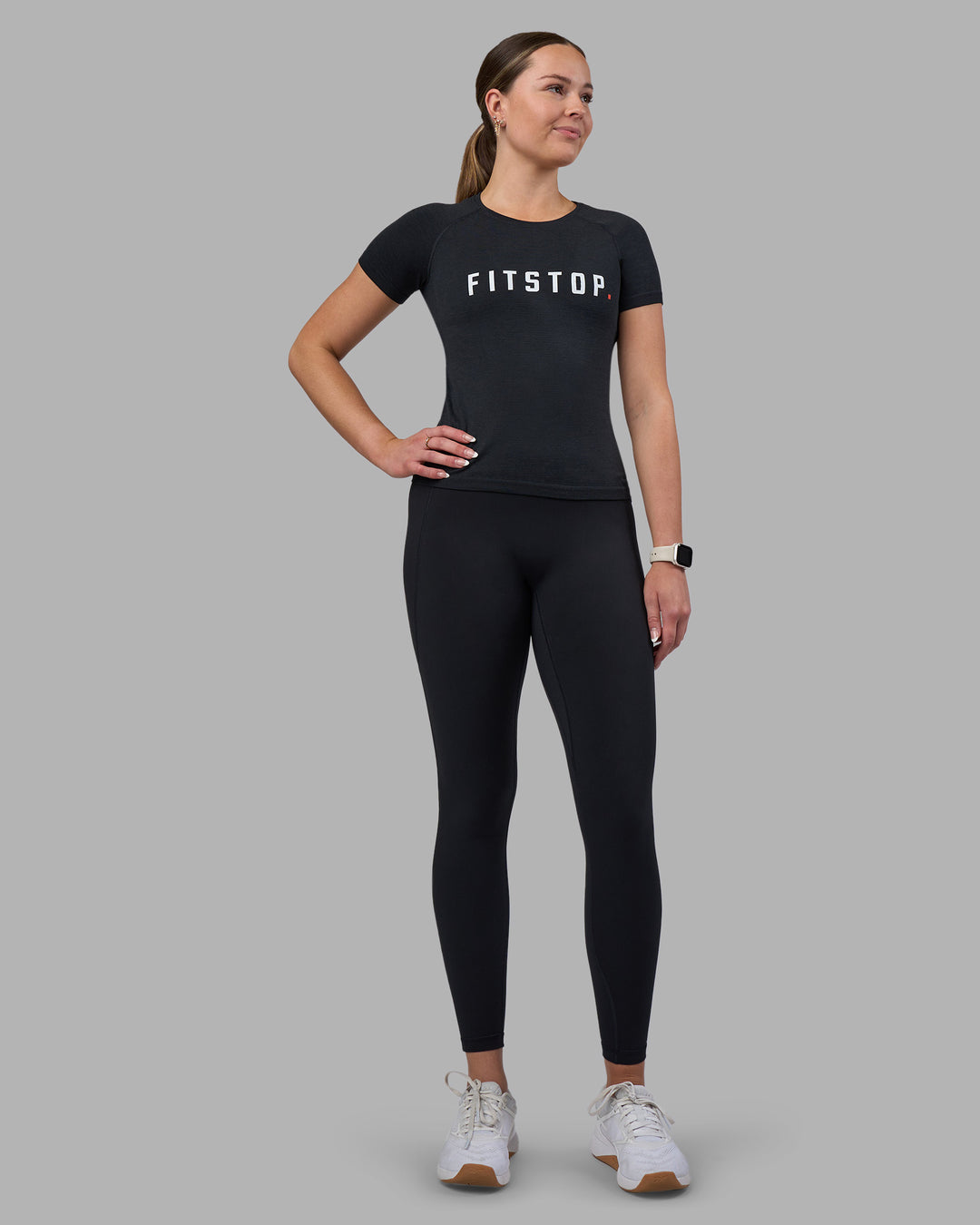 Woman wearing Fitstop AeroFLX+ Seamless Tee - Black | Model:Jade | Size:S - view 4