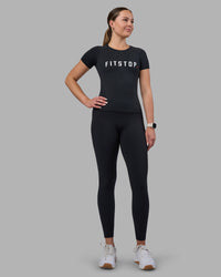 Woman wearing Fitstop AeroFLX+ Seamless Tee - Black | Model:Jade | Size:S | Thumbnail Index: 3