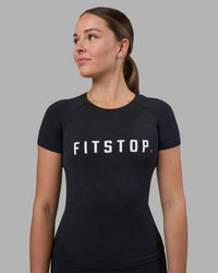 Woman wearing Fitstop AeroFLX+ Seamless Tee - Black | Model:Jade | Size:S | Thumbnail Index: 0