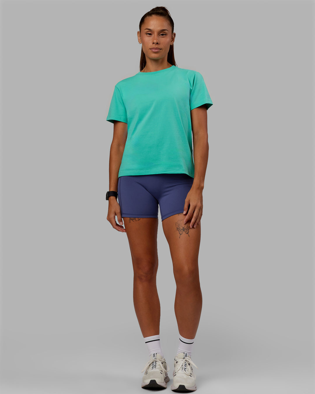 Woman wearing Love The Run FLXCotton Tee - Aquatic Awe-White - view 5