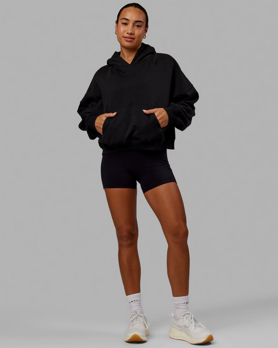 Woman wearing Love The Run Hoodie - Black - view 4