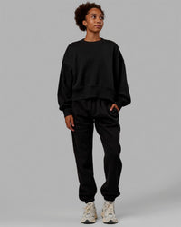 Woman wearing MVP Oversized Sweater - Black-Black | Thumbnail Index: 2