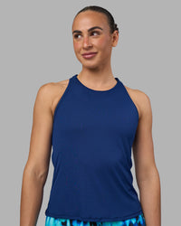 Woman wearing Pace Running Tank 2.0 - Midnight Blue | Model:Sophie | Size:S | Thumbnail Index: 0
