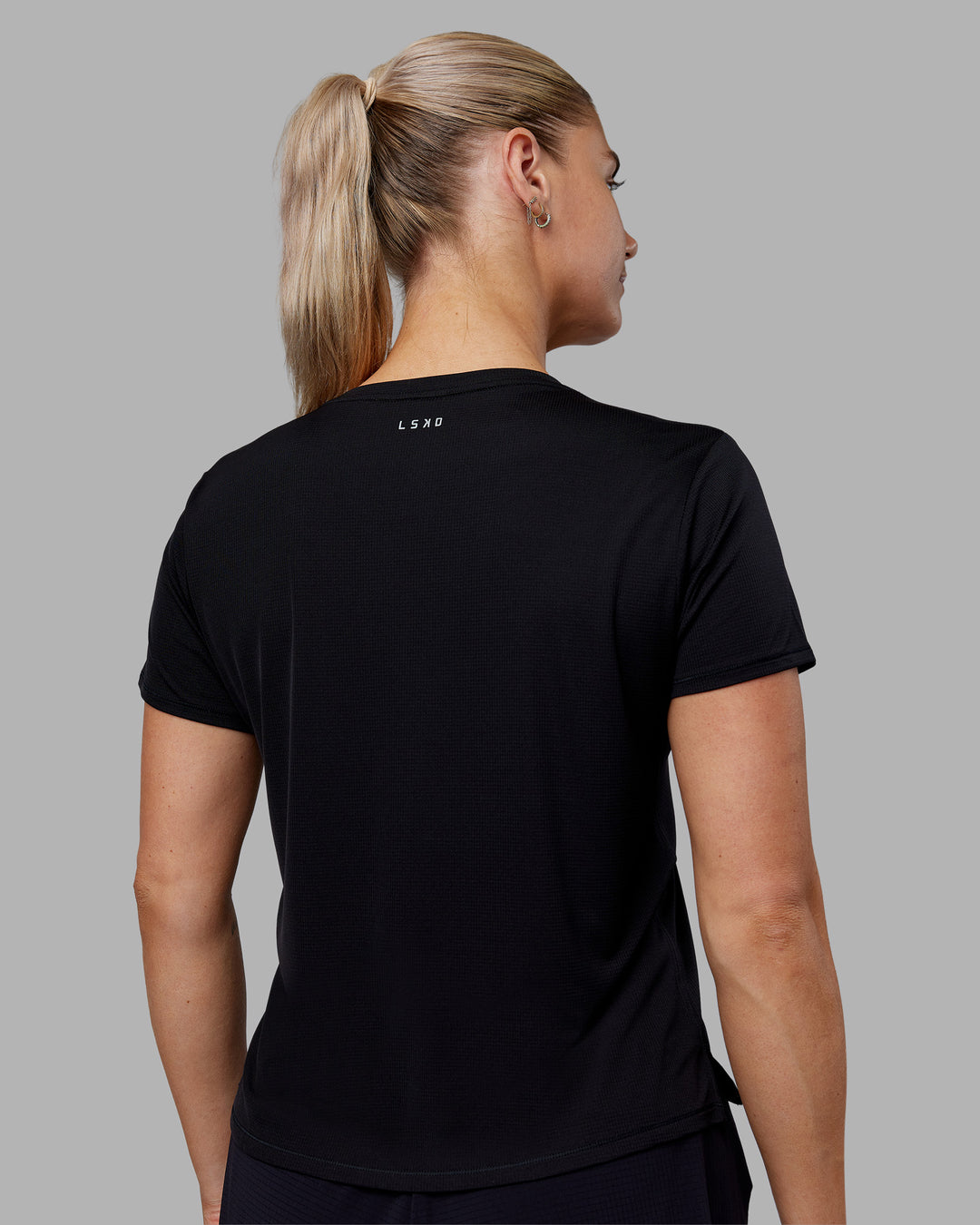 Woman wearing Pace Running Tee - Black | Model:Hannah | Size:S - view 3