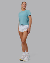 Woman wearing Pace Running Tee - Retro Blue | Model:Hannah | Size:S | Thumbnail Index: 3