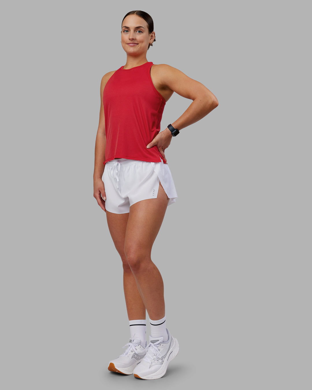 Woman wearing Pace Running Tank 2.0 - Scarlet | Model:Keisha | Size:S - view 2