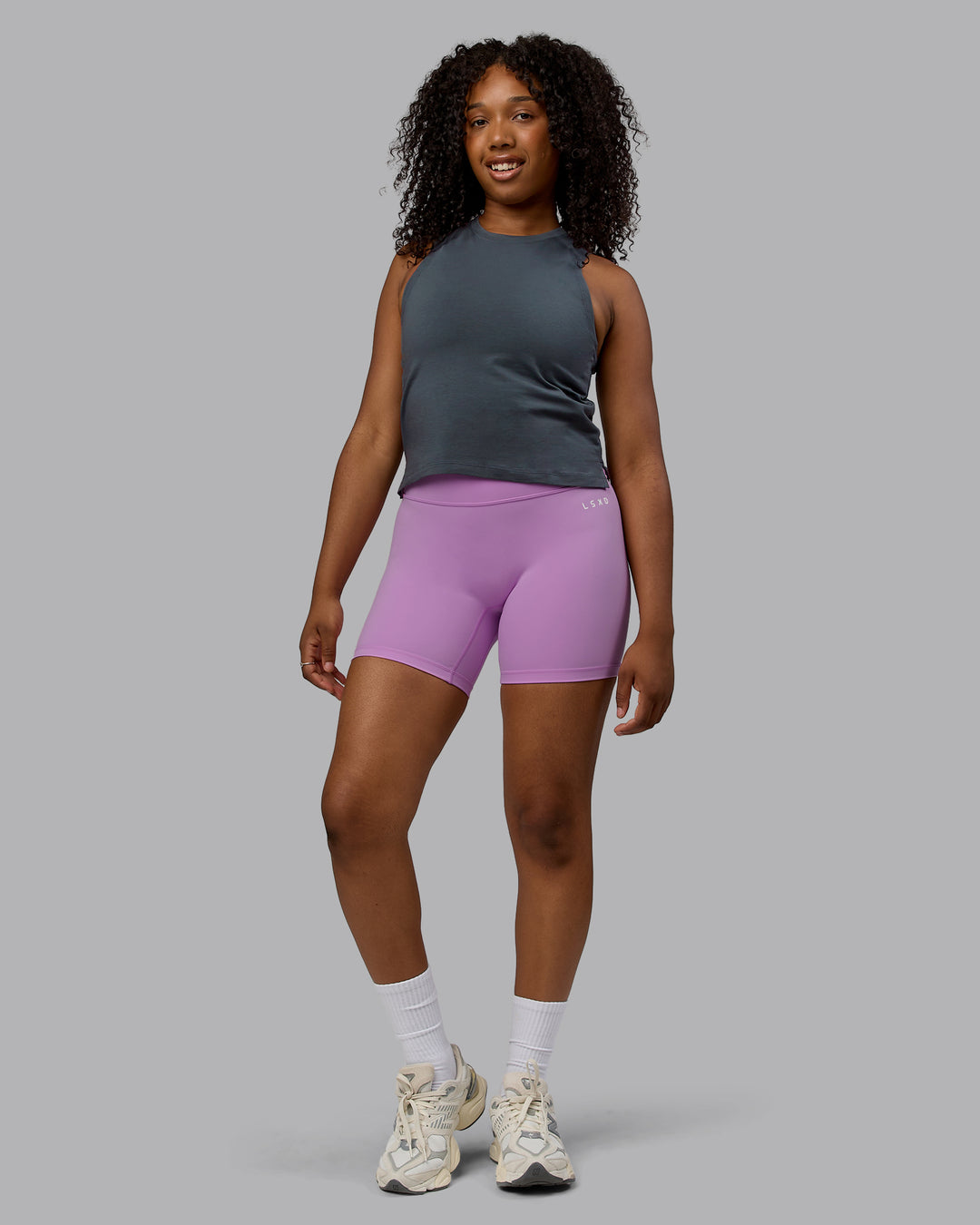 Woman wearing Deluxe PimaFLX Tank - Turbulence - view 5