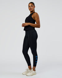 Woman wearing Wrap It Up FLXCotton Tank - Black | Model:Rosie | Size:S | Thumbnail Index: 5