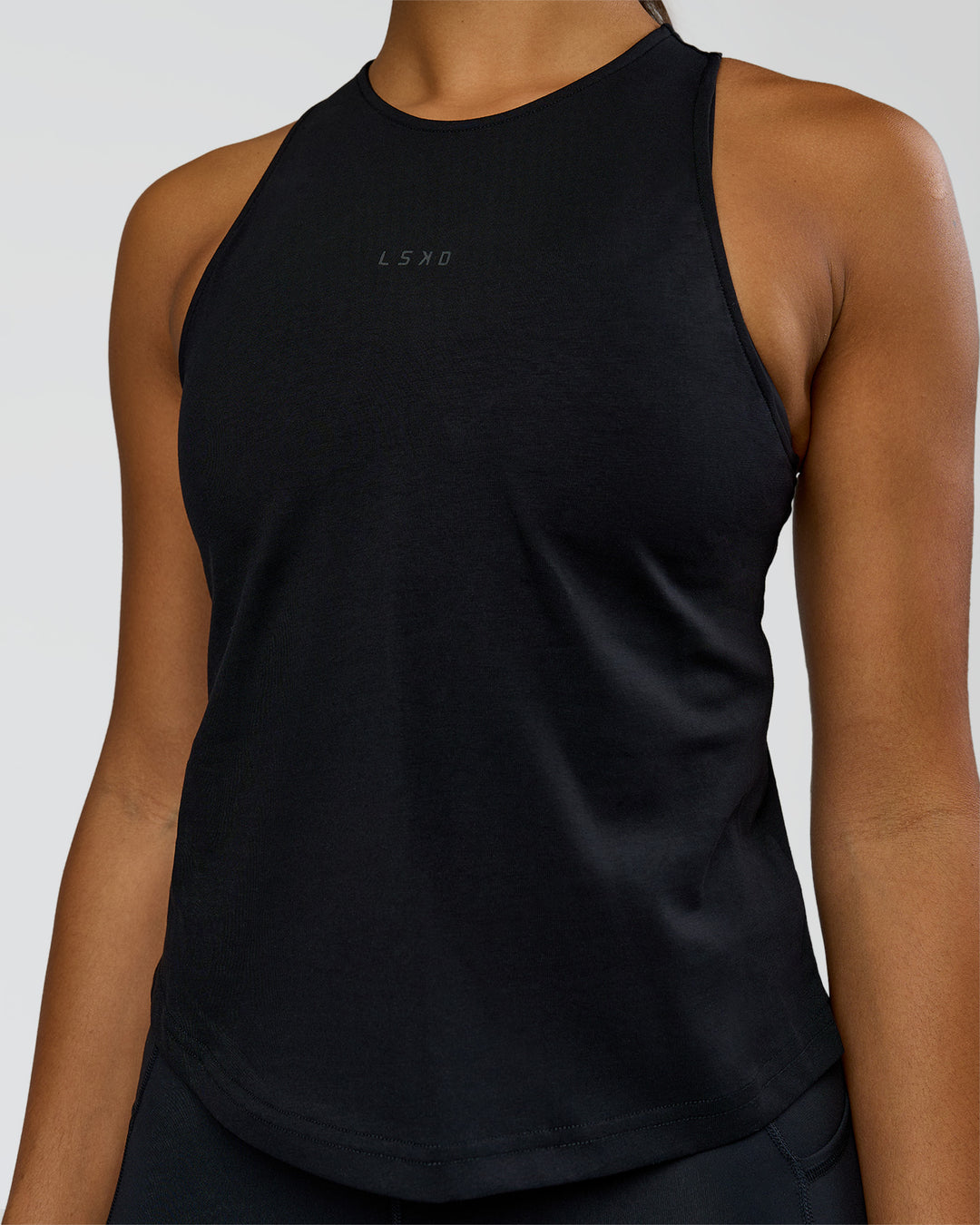 Woman wearing Wrap It Up FLXCotton Tank - Black | Model:Rosie | Size:S - view 4