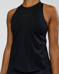 Woman wearing Wrap It Up FLXCotton Tank - Black | Model:Rosie | Size:S | Thumbnail Index: 3