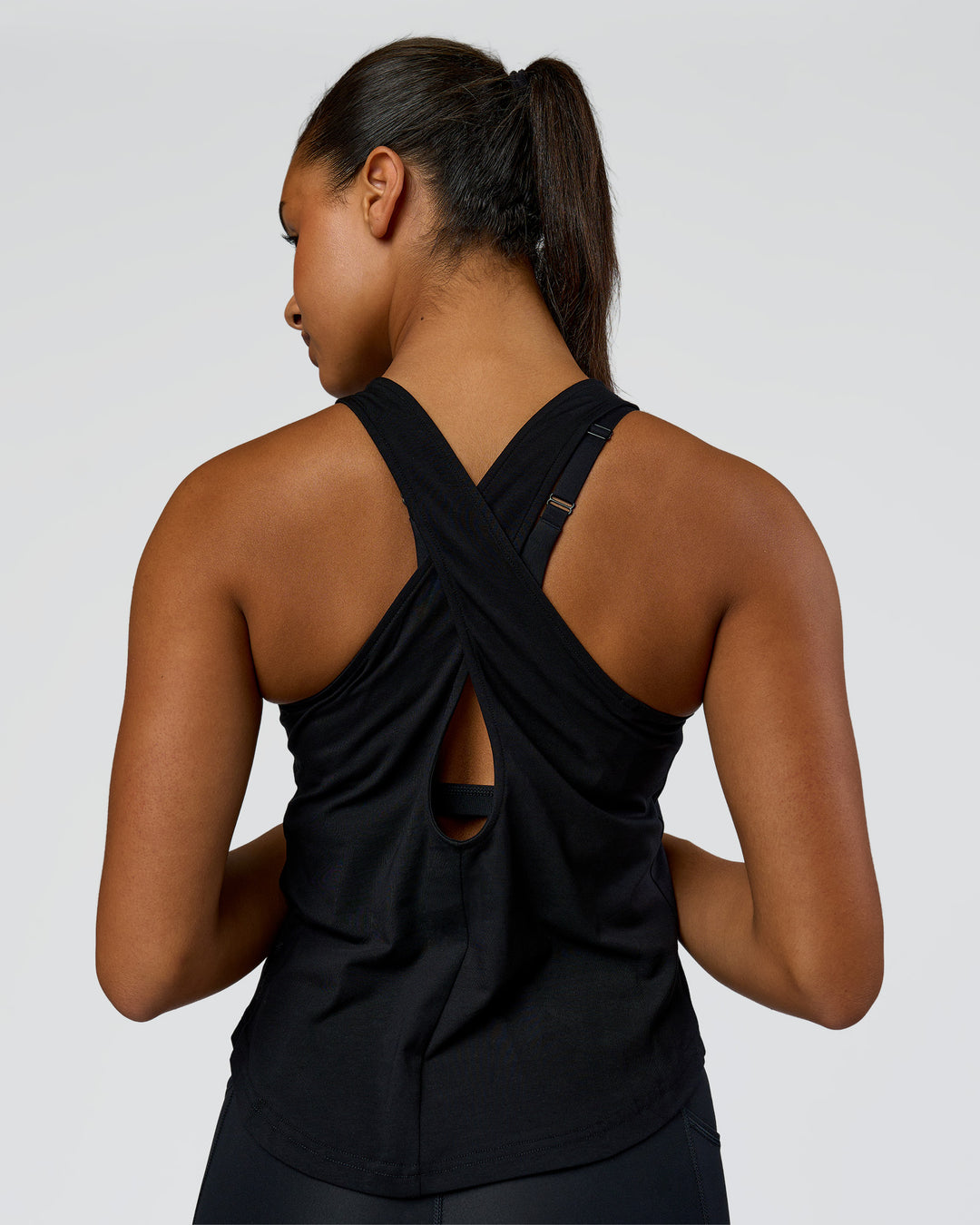 Woman wearing Wrap It Up FLXCotton Tank - Black | Model:Rosie | Size:S - view 5