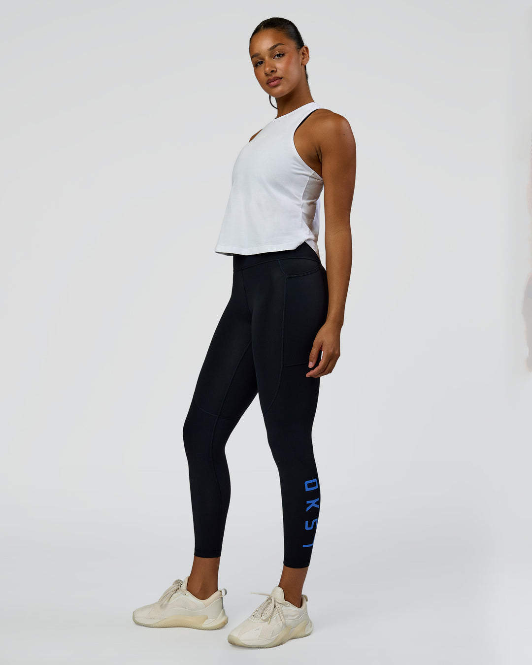 Woman wearing Wrap It Up FLXCotton Tank - White | Model:Rosie | Size:S - view 8