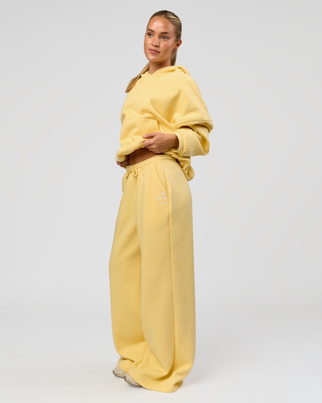 Woman wearing Zola Oversized Hoodie - Lemon | Model:Issy | Size:S - view 8