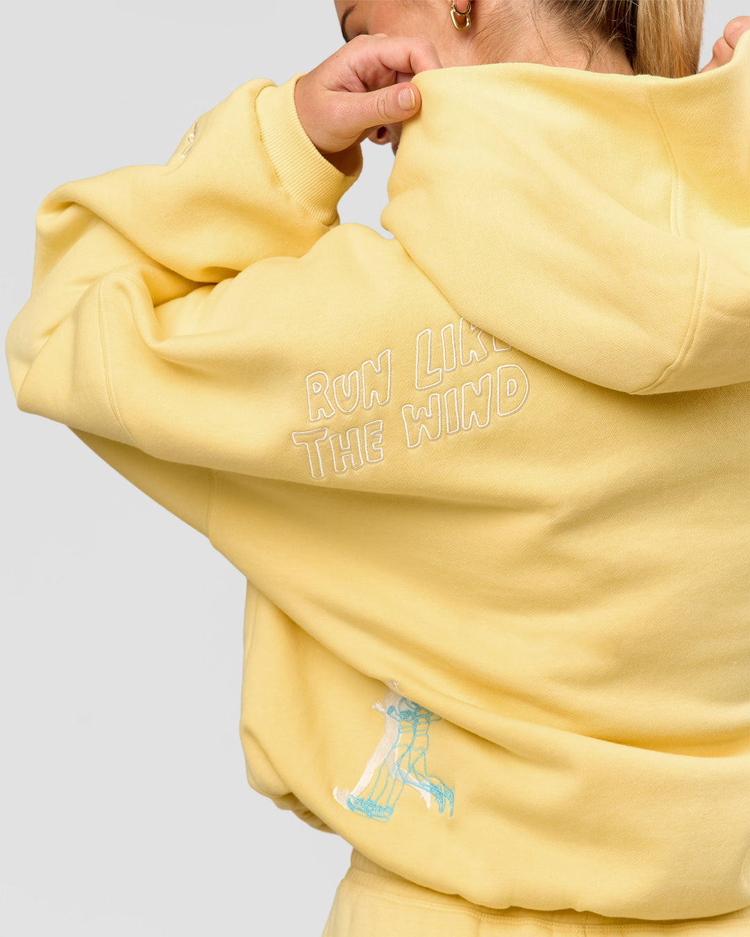 Woman wearing Zola Oversized Hoodie - Lemon | Model:Issy | Size:S - view 18