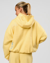 Woman wearing Zola Oversized Hoodie - Lemon | Model:Issy | Size:S | Thumbnail Index: 18