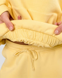 Woman wearing Zola Oversized Hoodie - Lemon | Model:Issy | Size:S | Thumbnail Index: 2