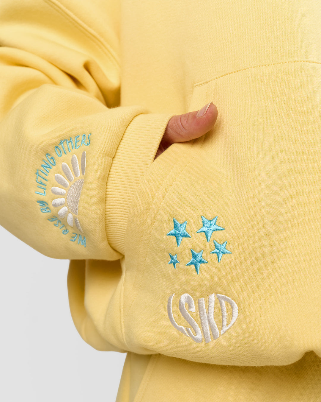 Woman wearing Zola Oversized Hoodie - Lemon | Model:Issy | Size:S - view 4
